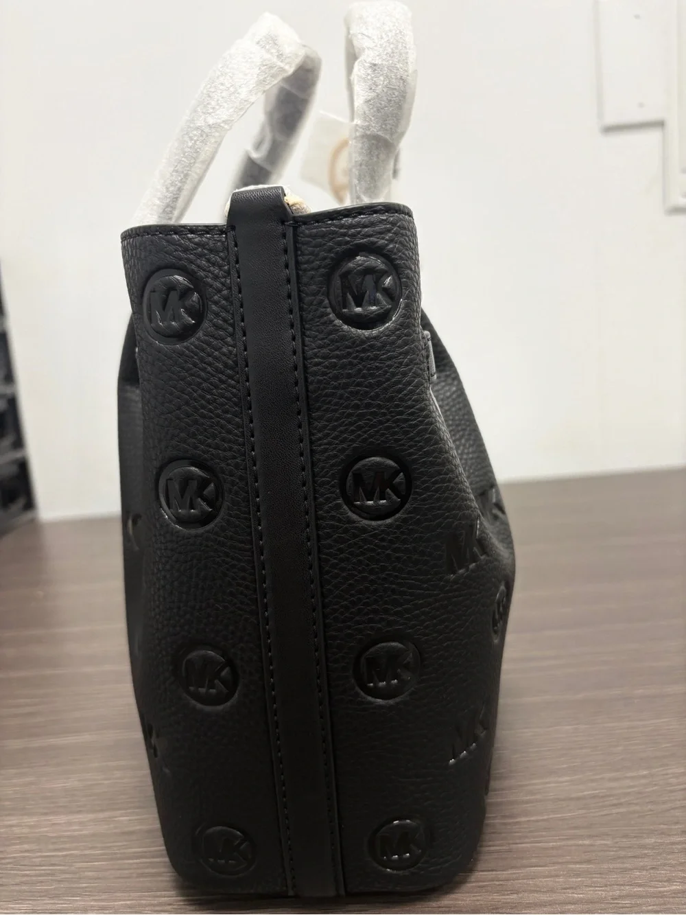 Michael Kors Carson Medium Debossed Satchel.